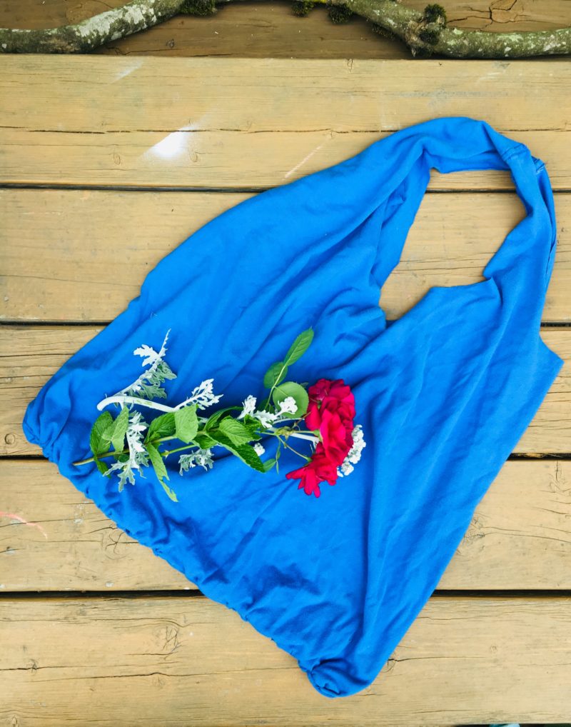 light blue t-shirt upcycled tote bag with a red rose