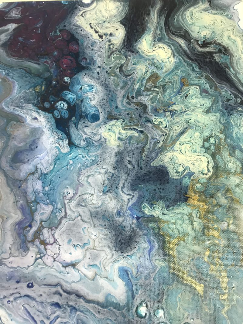 acrylic paint pour blue white gold swirled like a cloud