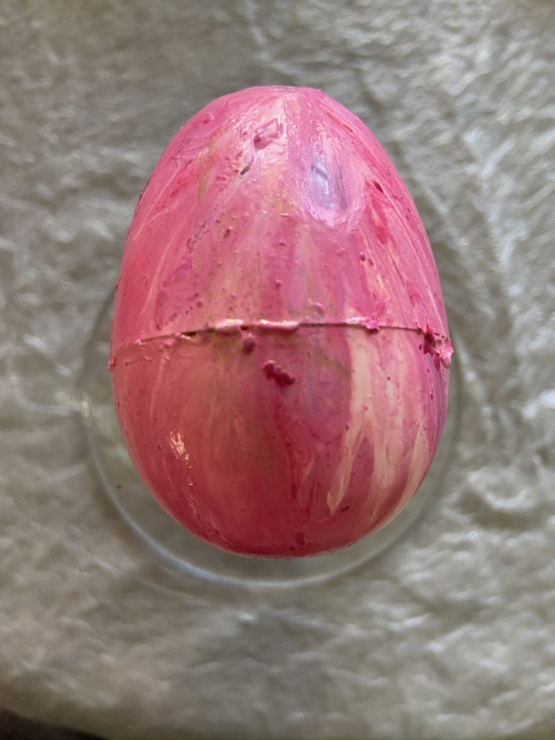 pink easter egg globbed with glue